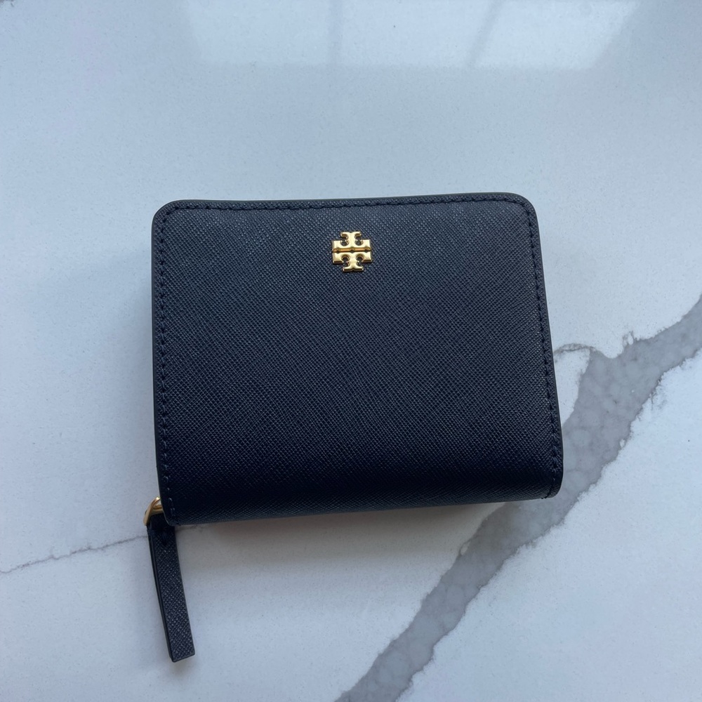 Tory Burch small navy blue wallet.